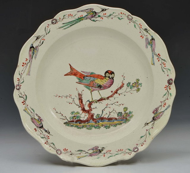 Appraisal: AN TH TH CENTURY CREAMWARE DISH painted to the centre