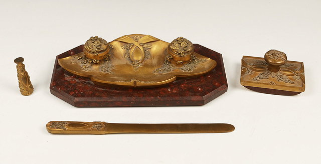 Appraisal: A FRENCH ORMOLU DESK SET consisting of an inkwell on