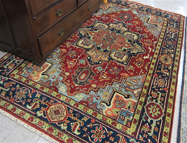 Appraisal: HAND KNOTTED ORIENTAL CARPET Persian Serapi design ' x '