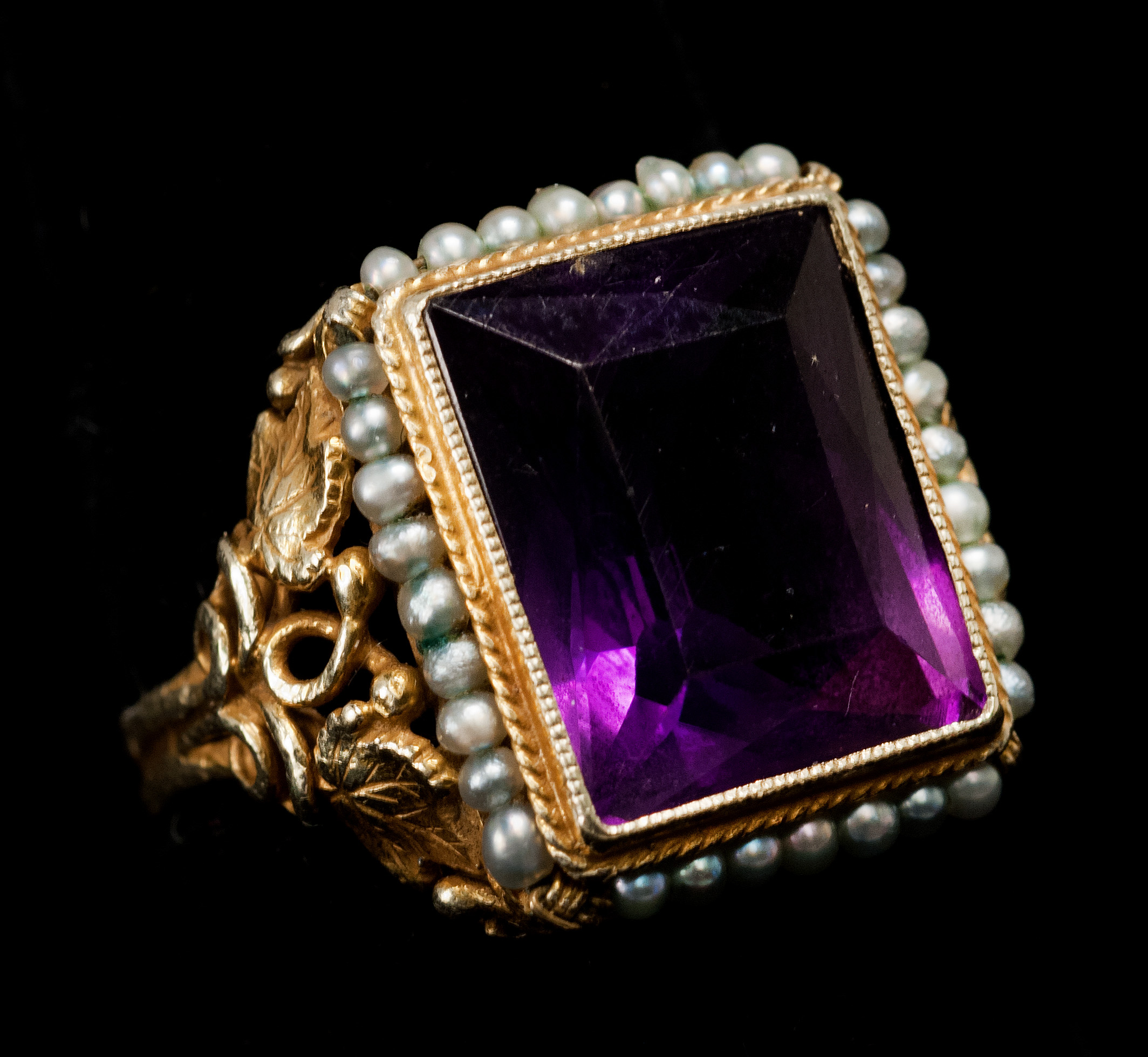 Appraisal: YELLOW GOLD AMETHYST AND SEED PEARL RING Set with a