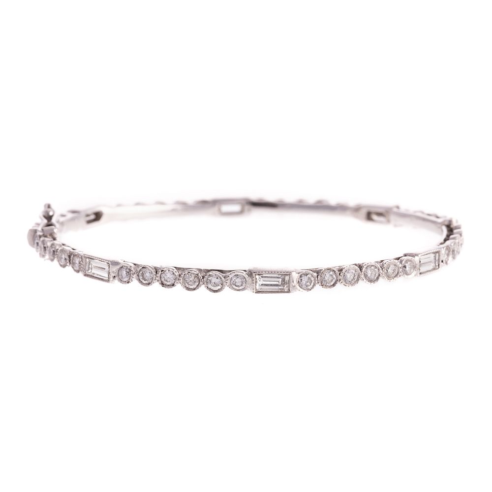 Appraisal: A Handmade Platinum Diamond Bangle Platinum diamond bangle handmade with