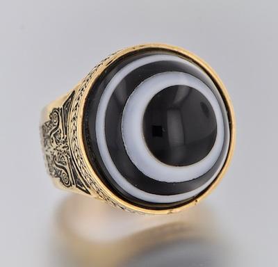 Appraisal: A Massive Gold Ring With Bull's Eye Designed Onyx k