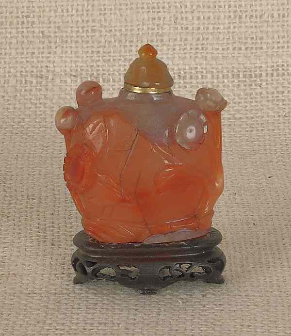 Appraisal: Chinese carved hardstone snuff bottle h