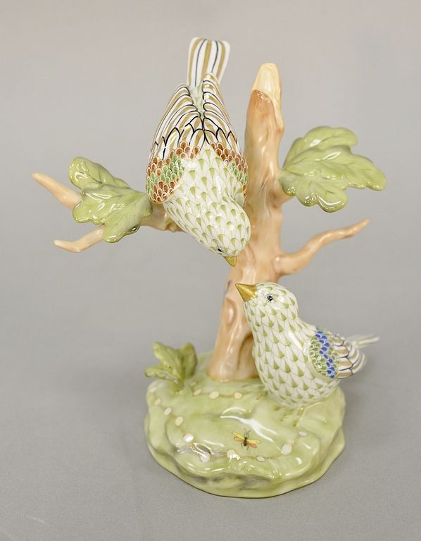 Appraisal: Herend porcelain bird in tree figurine Loving Couple green fishnet