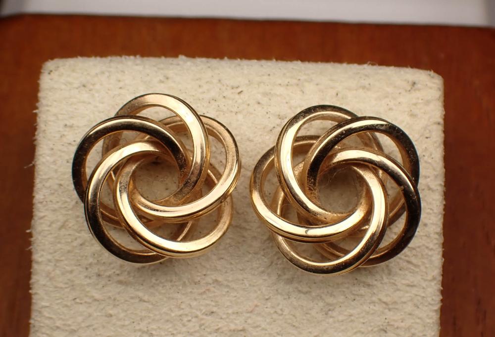 Appraisal: PAIR OF FOURTEEN KARAT GOLD LOVE KNOT EARRINGS each yellow