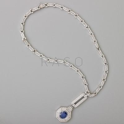 Appraisal: DIAMOND AND SAPPHIRE K WHITE GOLD NECKLACE Geometric links and