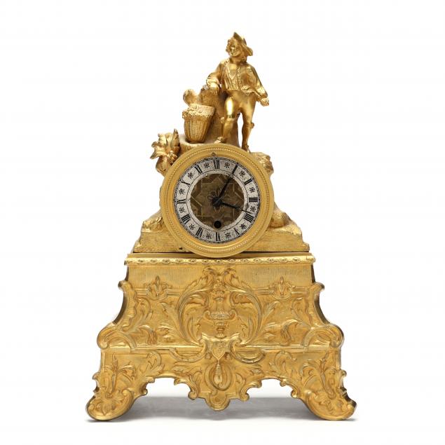 Appraisal: JUNGHANS GERMAN GILT BRONZE FIGURAL MANTEL CLOCK Late th century