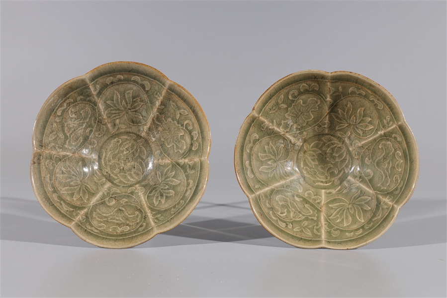 Appraisal: Pair of Chinese ceramic celadon glazed bowls with incised floral