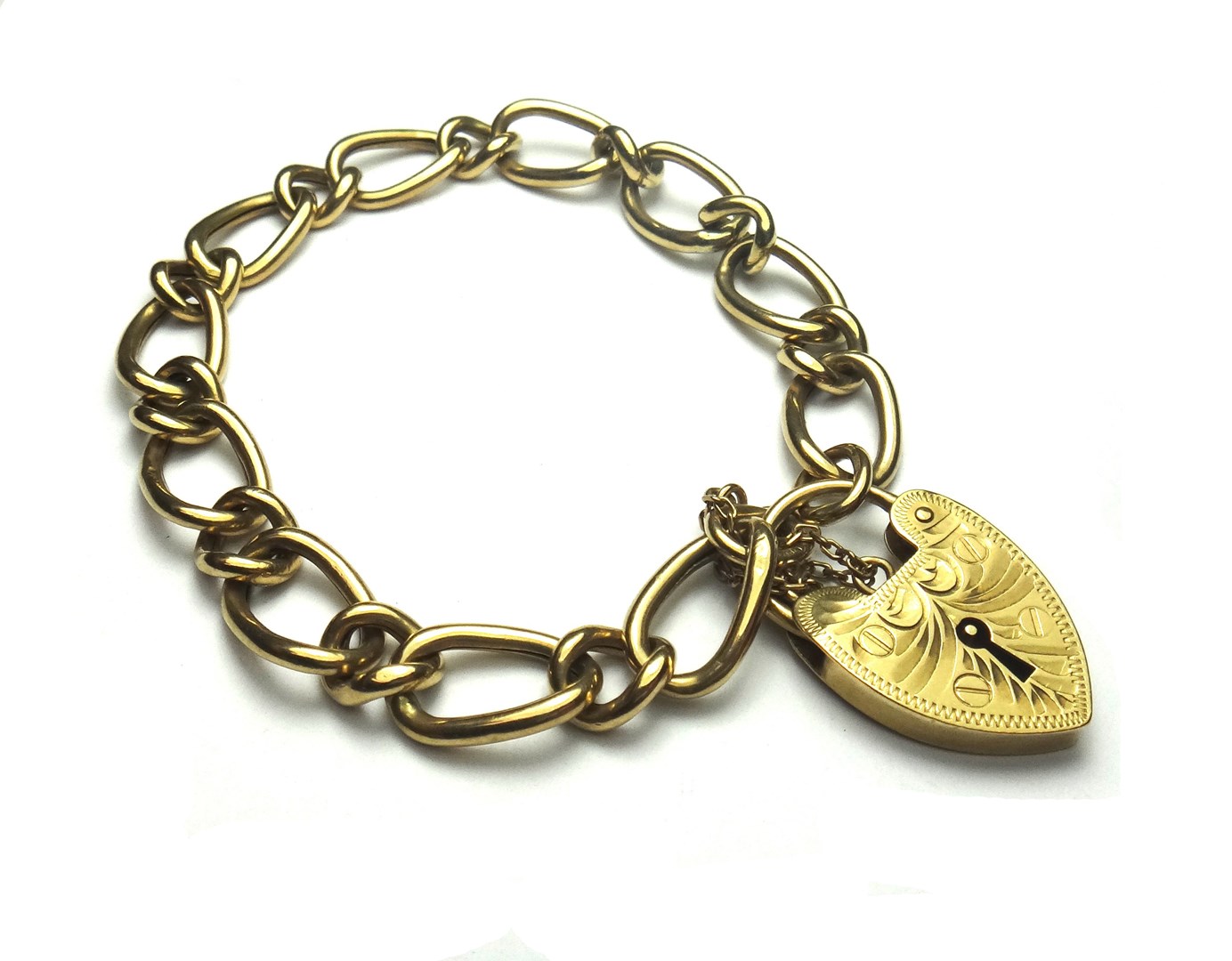 Appraisal: A ct gold large and small curb link bracelet on