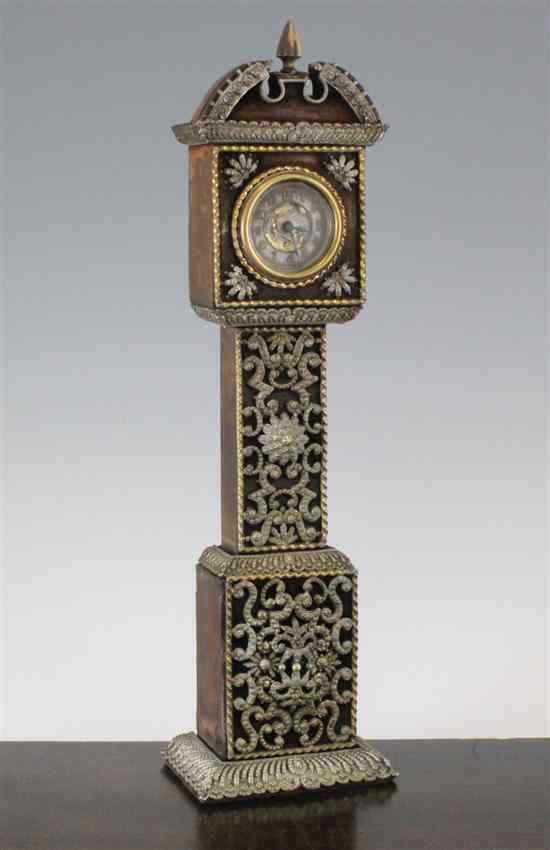 Appraisal: An Edwardian mantel timepiece modelled as a longcase clock with