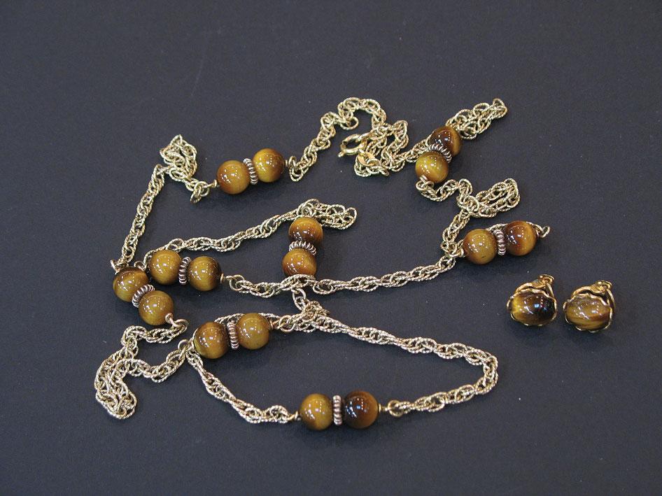 Appraisal: A CT YELLOW GOLD CHAIN interspersed with tigers eye beads