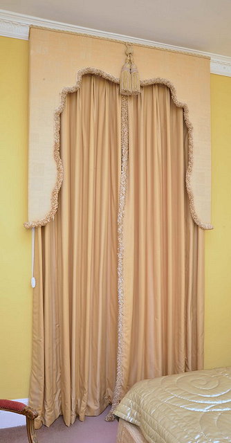 Appraisal: A PAIR OF IVORY FULL LENGTH CURTAINS with pelmet