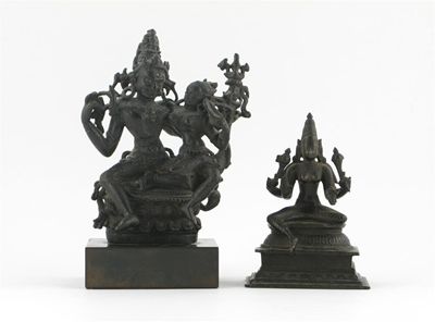 Appraisal: An Indian bronze seated figure of Sarasvati th century and