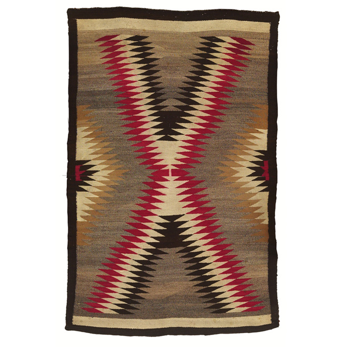 Appraisal: Navajo rug serrated pattern in red brown and cream minor