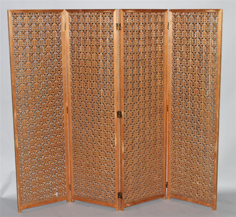 Appraisal: MODERN WOODEN SCREEN fashioned of four panels reticulated with modernistic