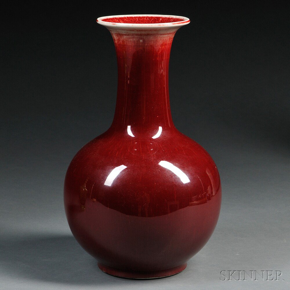 Appraisal: Red-glazed Vase China bottle shape with flared mouth four-character Jingdezhen