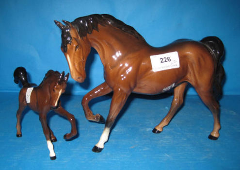 Appraisal: Royal Doulton Spirit Of Freedom DA A And Springtime Foal