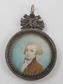 Appraisal: A miniature on ivory of a young man in late