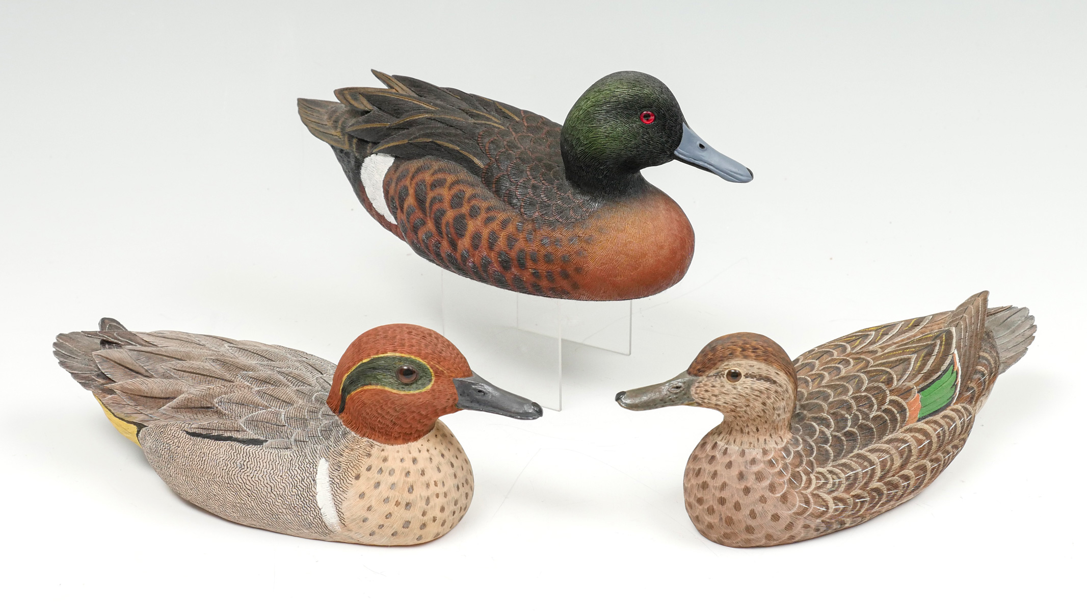 Appraisal: SIGNED DUCK DECOYS Comprising - Jules A Bouillet carved duck