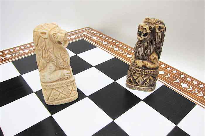 Appraisal: HAND CARVED BONE CHESS SET WITH BOARD one set of