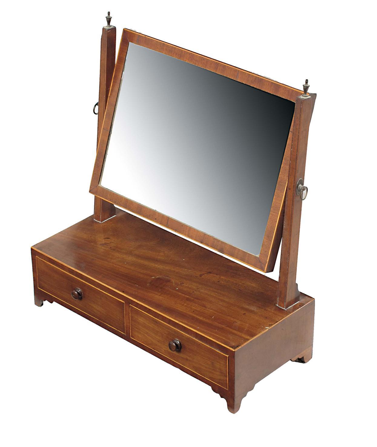 Appraisal: An early th century mahogany toilet mirror