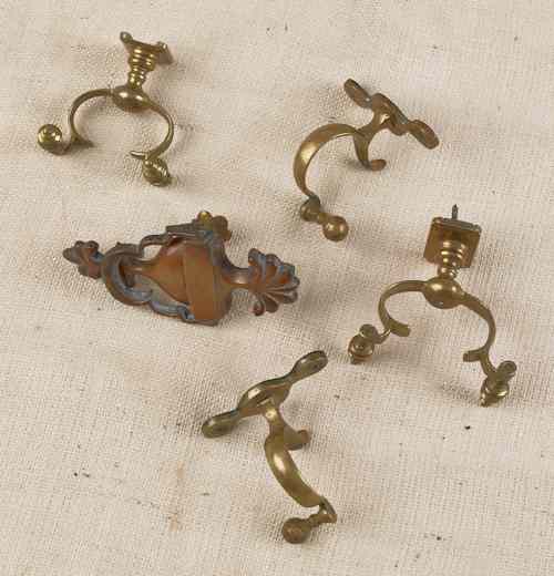 Appraisal: Four brass jamb hooks together with a brass door knocker