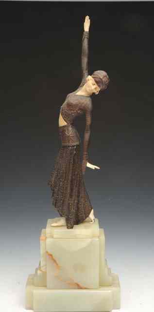 Appraisal: AN ART DECO BRONZED FIGURE of a dancing girl on