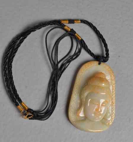 Appraisal: Chinese Carved Jade Buddha PendantFinely carved and polished pendant depicting