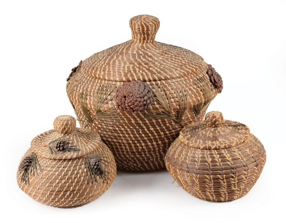 Appraisal: Three Coushatta Lidded Baskets two decorated with pinecones largest h