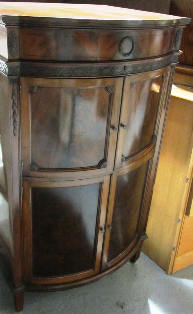 Appraisal: A late th century mahogany bowfront gramophone cabinet on tapering