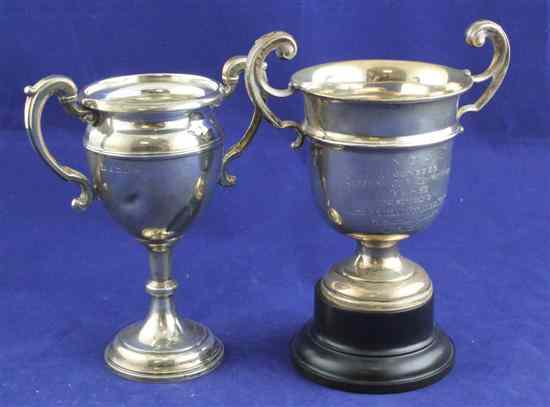 Appraisal: Two George V silver two handled boxing presentation trophy cups