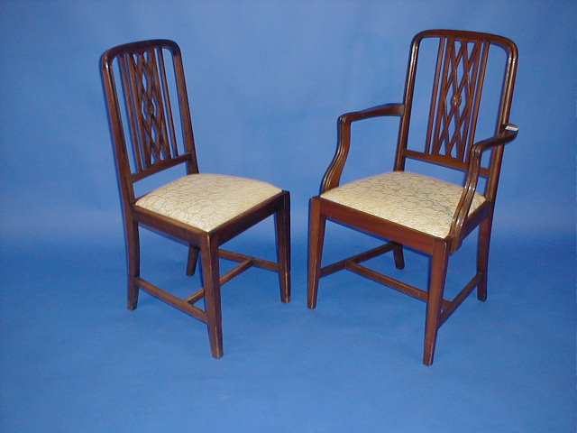 Appraisal: A set of six including carver Edwardian mahogany dining chairs