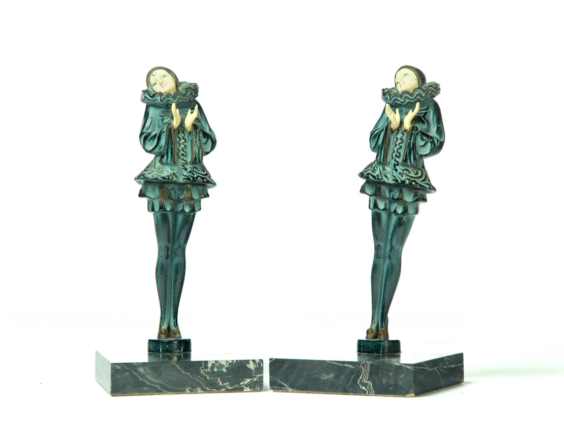 Appraisal: PAIR OF ART DECO FEMALE FIGURINES ON BLACK MARBLE BASES