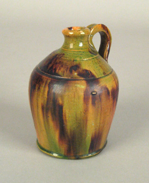 Appraisal: Shenandoah Valley redware jug th c with brown orange and