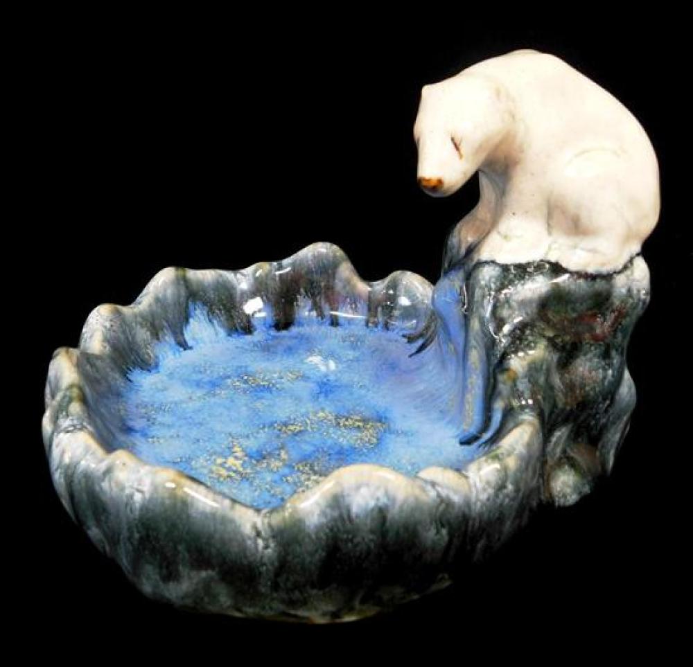 Appraisal: Doulton Lambeth polar bear on rock above blue pool c