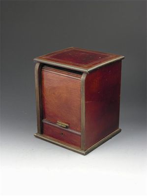 Appraisal: A French mahogany and brass mounted cigar cabinet with a