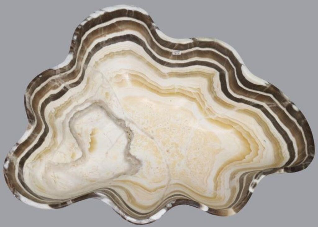 Appraisal: Natural edge onyx bowl Mexico of organic form with some