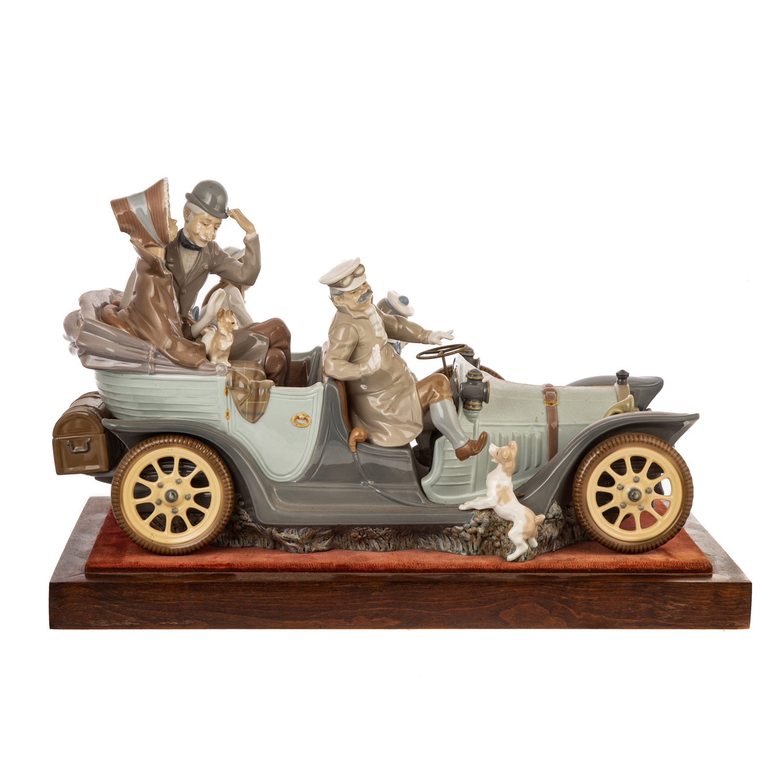 Appraisal: LLADRO PORCELAIN ANTIQUE CAR Issued large antique style touring sedan