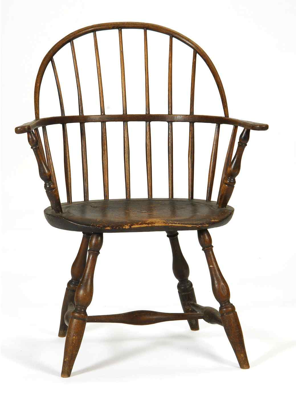 Appraisal: ANTIQUE AMERICAN SACKBACK WINDSOR ARMCHAIRLate th CenturyIn ash and pine