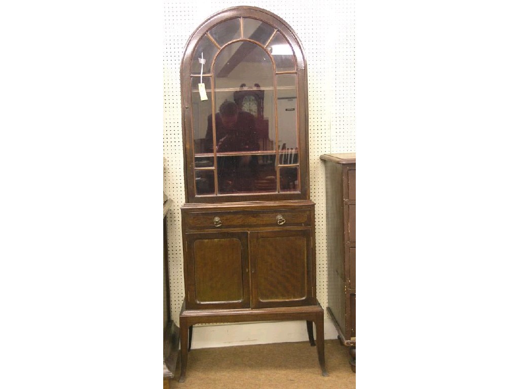 Appraisal: An early th century mahogany display cabinet dome-shape upper stage