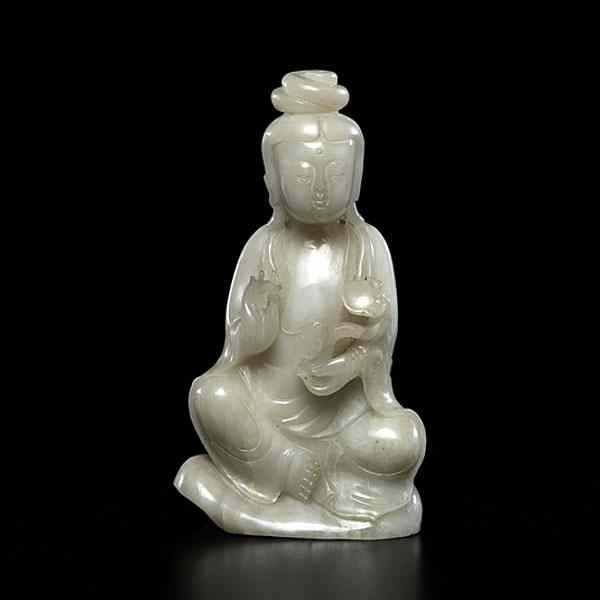 Appraisal: Chinese Hardstone Guanyin Chinese th century A white hardstone carving