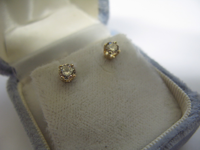 Appraisal: PAIR OF DIAMOND AND FOURTEEN KARAT GOLD EAR STUDS each