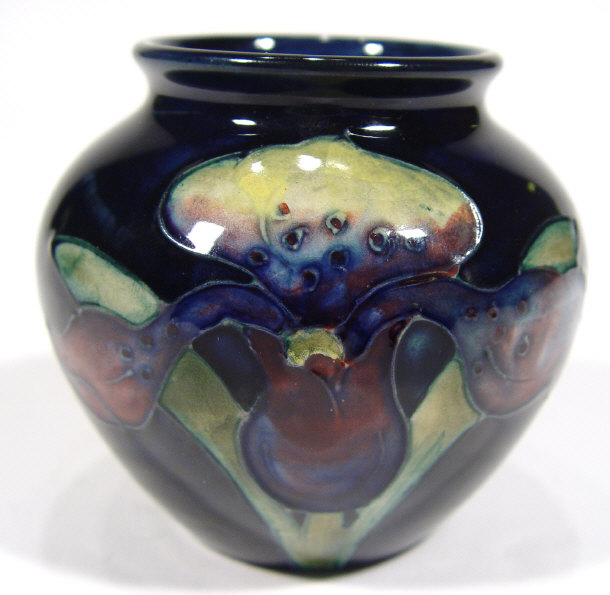 Appraisal: Miniature Moorcroft pottery vase hand painted and tubelined with orchids