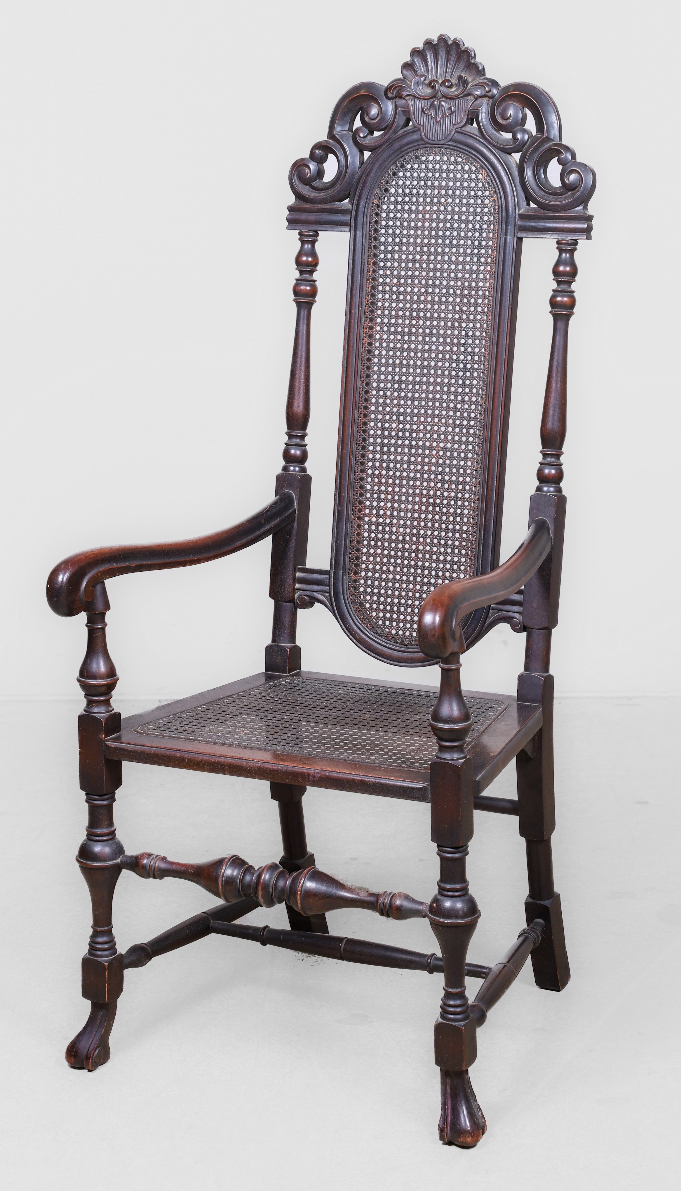 Appraisal: Flemish style carved walnut open armchair carved crest with shell