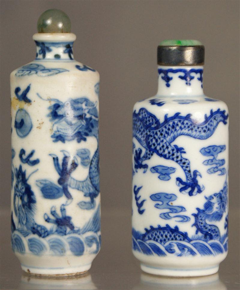 Appraisal: Cylindrical porcelain snuff bottles with blue underglaze dragon seeking flaming