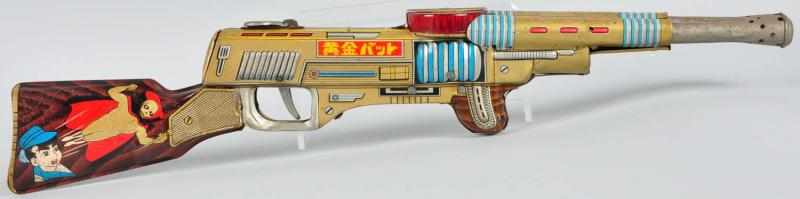 Appraisal: Tin Litho Golden Bat Superhero Rifle Toy Description Japanese Working