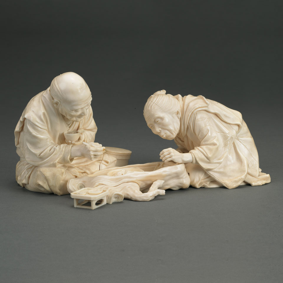 Appraisal: Tokyo School Ivory Okimono Group of an Elderly Couple sitting