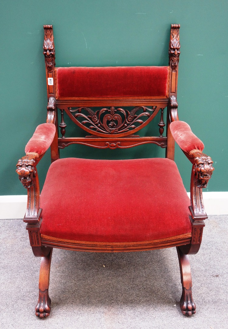 Appraisal: A th century continental walnut 'X' framed open armchair with