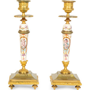 Appraisal: A Pair of French Gilt Bronze and Painted Porcelain Candlesticks