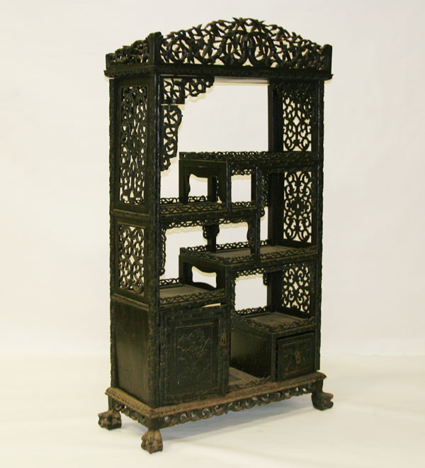 Appraisal: Intricately carved Chinese etagere cabinet impressive detailed work on panels